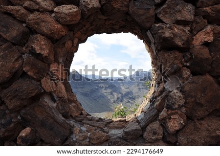 a stone wall window in Gran Canaria with the view in focus
