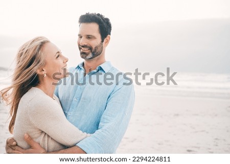 We find peace at the beach. Shot of a mature couple spending a day at the beach.