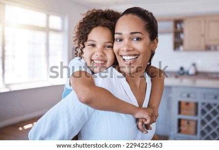 The strength of motherhood is greater than natural laws. Portrait of a little girl bonding with her mother at home. Royalty-Free Stock Photo #2294225463