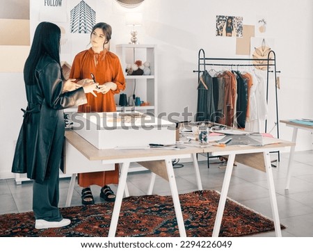 This is my vision. Shot of two young businesswomen talking at work.