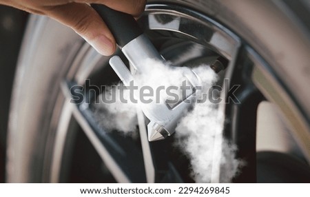 inspection Measure quantity Inflated Rubber tires car Close up hand holding machine Inflated pressure gauge for car tyre pressure measurement for automotive automobile
 Royalty-Free Stock Photo #2294269845