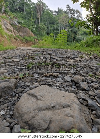 broken cobblestone road in mountain