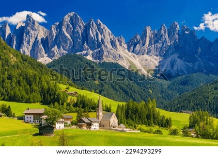The Church of Santa Maddalena and The Odle Mountain Peaks In Background, Panoramic View, Dolomites, Val di Funes, South Tyrol, Italy
