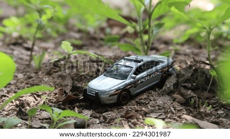 Replica photo of a police car in action