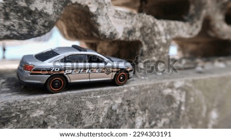 a photo of a police car replica that looks very real