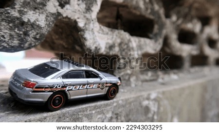 a photo of a police car replica that looks very real