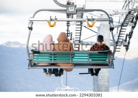 People on a chair lift