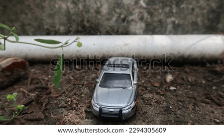 Toy car photos look very real, like a police car
