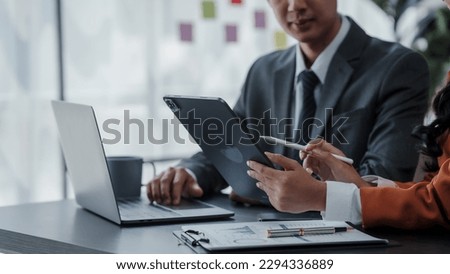 Profile of the firm's accountant for company registration, bookkeeping, asian people working with Deferred Incomes, Drawing Account, stock market, Depletion, Doubtful Debt, Equivalent Units Royalty-Free Stock Photo #2294336889