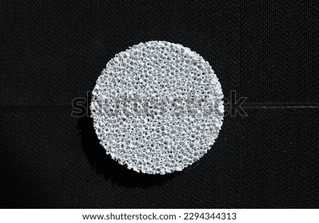 Ceramic-coated sponge was created from the synthesis of nanotechnology to research a new type of desiccant for use in the food dehumidification industry and the medical field. Royalty-Free Stock Photo #2294344313
