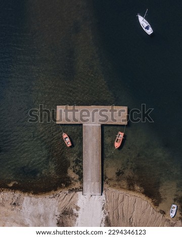 Aerial photo of a ship dock with symmetry at Greece