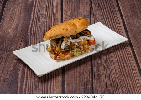 A submarine sandwich, commonly known as a sub, hoagie (Philadelphia metropolitan area and Western Pennsylvania English). Royalty-Free Stock Photo #2294346173