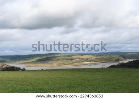 The beautiful  countryside, with the River Taf valley, near Laugharne, Carmarthenshire, Wales, UK on a bright afternoon in mid April.