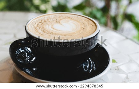 Soft focus on capuccino coffee cup, coffee for background - vintage effect process picture