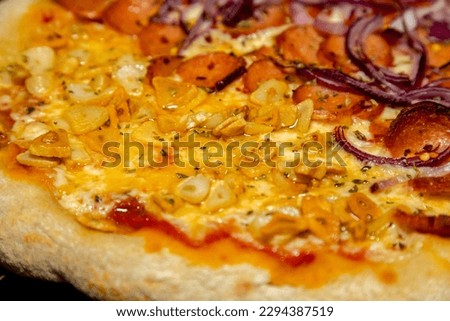 Traditional Pizza half garlic and oil and half pepperoni, typical of Brazil