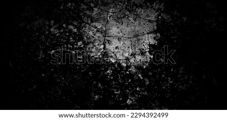 Black cement concrete wall background texture with cracks to show visible mysterious background.