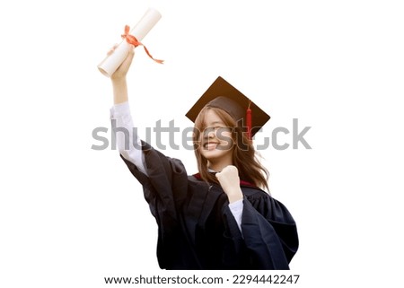 College degree graduations. Happy young Asian girl in gown with mortarboard isolated on white background. Royalty-Free Stock Photo #2294442247