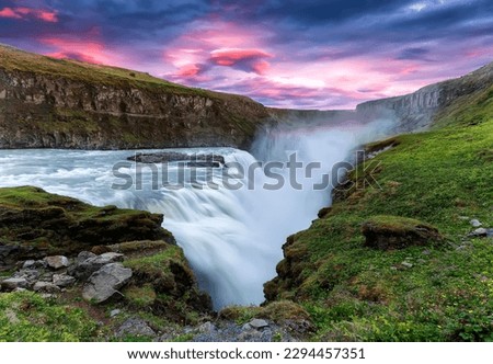 Powerfull Gullfoss waterfall in Iceland during sunset. Amazing Iceland nature landscape. popular tourist attraction. Iceland is iconic country for landscape photographers. Scenic Image of Iceland