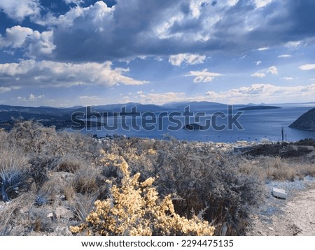 infrared photography image taken from hill of seaside village in greece