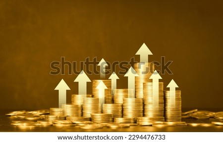 Double exposure of coin stack with finance graph and chart for business and investment concept. Royalty-Free Stock Photo #2294476733
