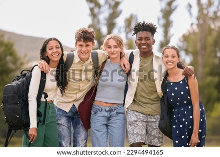 Portrait Of Multi-Cultural Secondary Or High School Students Hugging Outdoors Royalty-Free Stock Photo #2294494165