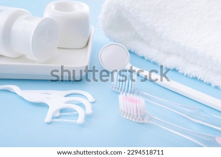 Oral care goods taken with a blue back Royalty-Free Stock Photo #2294518711