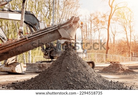 Concrete delivered on the construction site and offloaded from a volumetric concrete mixer Royalty-Free Stock Photo #2294518735