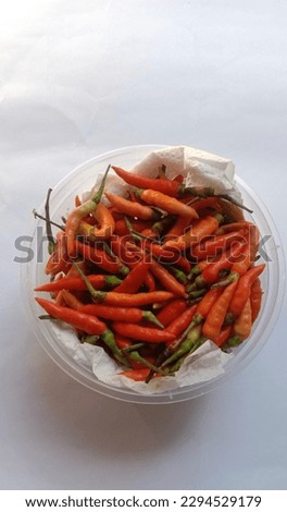 This picture take in 27 april 2023 in palu city ,indonesia . this is a small bowl of cayenne pepper. 