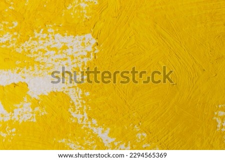 Close up of the yellow paint strokes texture