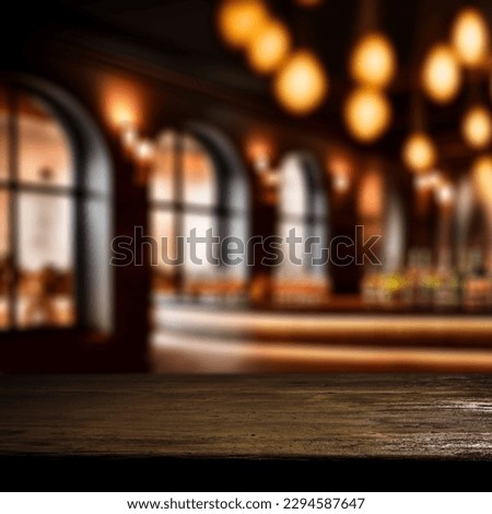 Dark mood photo of cafe interior and desk of free space for your decoration. 