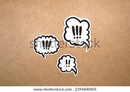 Three bubbles with exclamation marks, neutral background.  Keep attention concept,  importance background, warning. Royalty-Free Stock Photo #2294600405