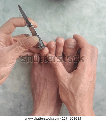 Cut your toenails so that they look neat and clean, with a nail clipper.