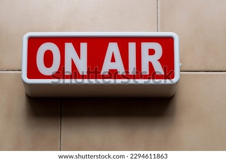 Poster, sign or signal with the warning indication "on air" Royalty-Free Stock Photo #2294611863
