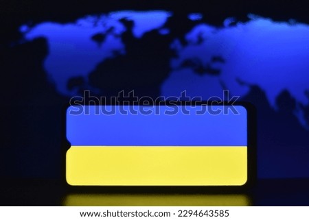 Closeup view of the Ukraine flag on the smartphone screen stock image