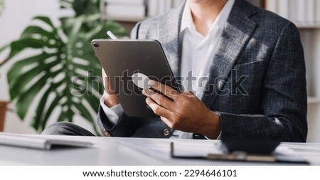 Document Businessman working modern computer Document Management System (DMS), Virtual online documentation database and process automation to efficiently manage files,