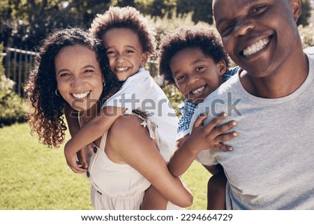 Happy african american family of four having fun and playing together in the sun. Carefree parents carrying sons for piggyback ride while bonding at park. Mom and dad enjoying quality time with kids Royalty-Free Stock Photo #2294664729