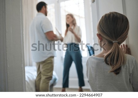 There is nothing admirable about leaving. Shot of a little girl watching her parents argue at home. Royalty-Free Stock Photo #2294664907