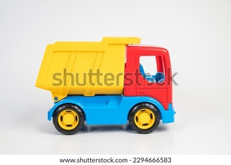 Plastic toy models of construction vehicles. Truck.