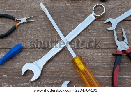 Images of various wrenches, screwdrivers, pliers and pliers. Tools of a handyman for repairs.
