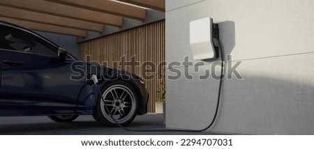Generic electric vehicle EV hybrid car is being charged from a wallbox on a contemporary modern residential building house Royalty-Free Stock Photo #2294707031