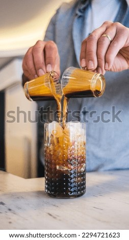 espresso brewing in a coffee shop