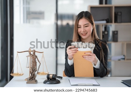 A woman offering a batch of hundred dollar bills. Venality, bribe, corruption concept. Royalty-Free Stock Photo #2294745683