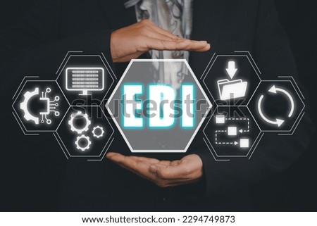 EDI, Electronic data interchange concept, Person hand holding Electronic data interchange icon on virtual screen.