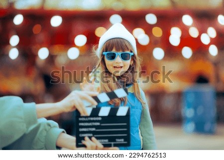 
Happy Charismatic Child Actor Performing in a Kids Movie. Adorable fashion model for kids clothing commercial 
 Royalty-Free Stock Photo #2294762513