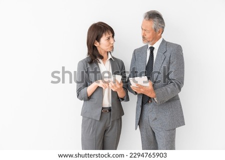 portrait of asian senior age couple, trouble,business,  smart phone, tablet computer