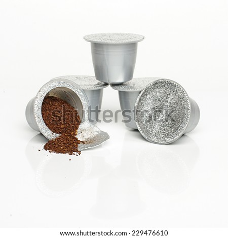 Single-serve coffee capsules isolated Royalty-Free Stock Photo #229476610
