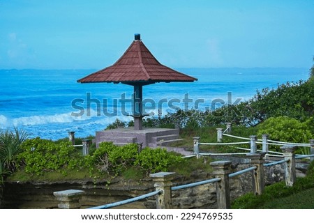 Pangandaran Beach (Shark Rock) a tourist attraction with views of the waves and cliffs, April 23, 2023 West Java Indonesia