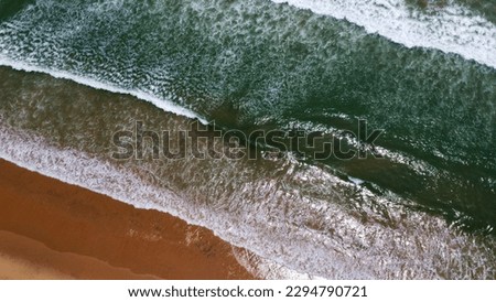 drone arial view of golden beach with white foamy wave HD