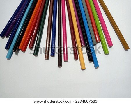 colorful colored pencils, on a white background