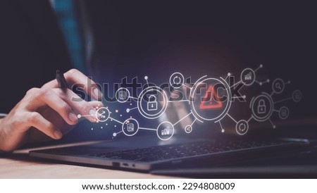 Programmer and virtual icons , exclamation mark ,alarm,computer virus detected ,danger warning concept or information error that should be urgently fixed and repaired ,Notification of security issues  Royalty-Free Stock Photo #2294808009